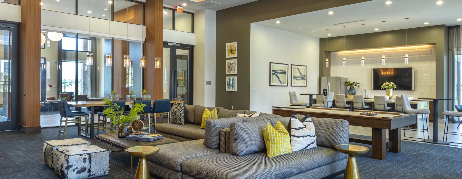 Beautiful clubroom with lounge seating and natural lighting