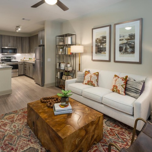 a living room with a couch and a table