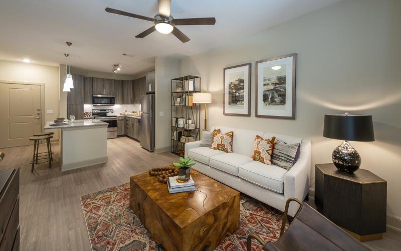 a living room with a couch and a table