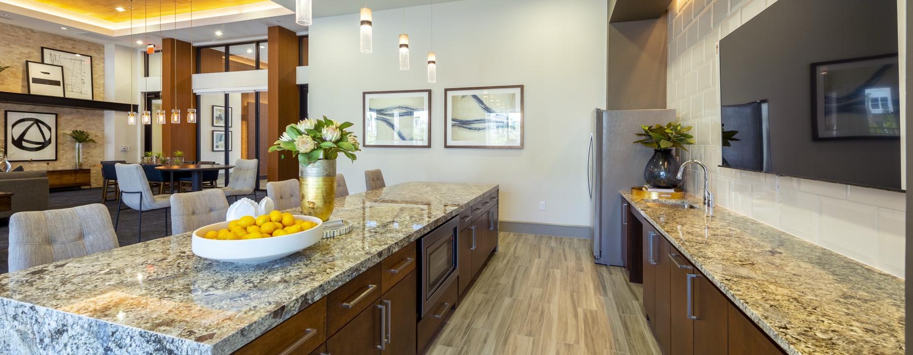a kitchen with a marble counter top