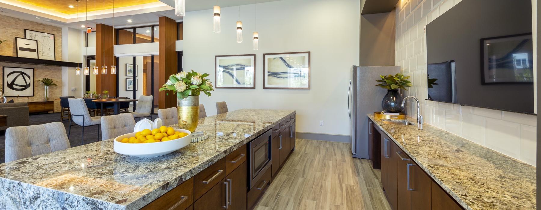 a kitchen with a marble counter top